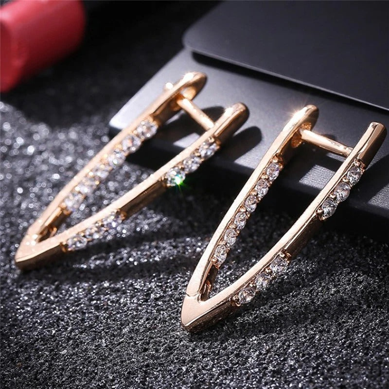 Boucles d'oreilles vintage élégantes en or rose 18K avec incrustation de zirconium
