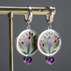 Boucles d'oreilles vintage faites à la main avec une fleur violette