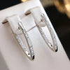 Boucles d'oreilles vintage élégantes en or rose 18K avec incrustation de zirconium